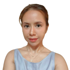 a woman is wearing a blue tank top and a necklace .