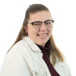 Smiling woman with long hair on a green background.